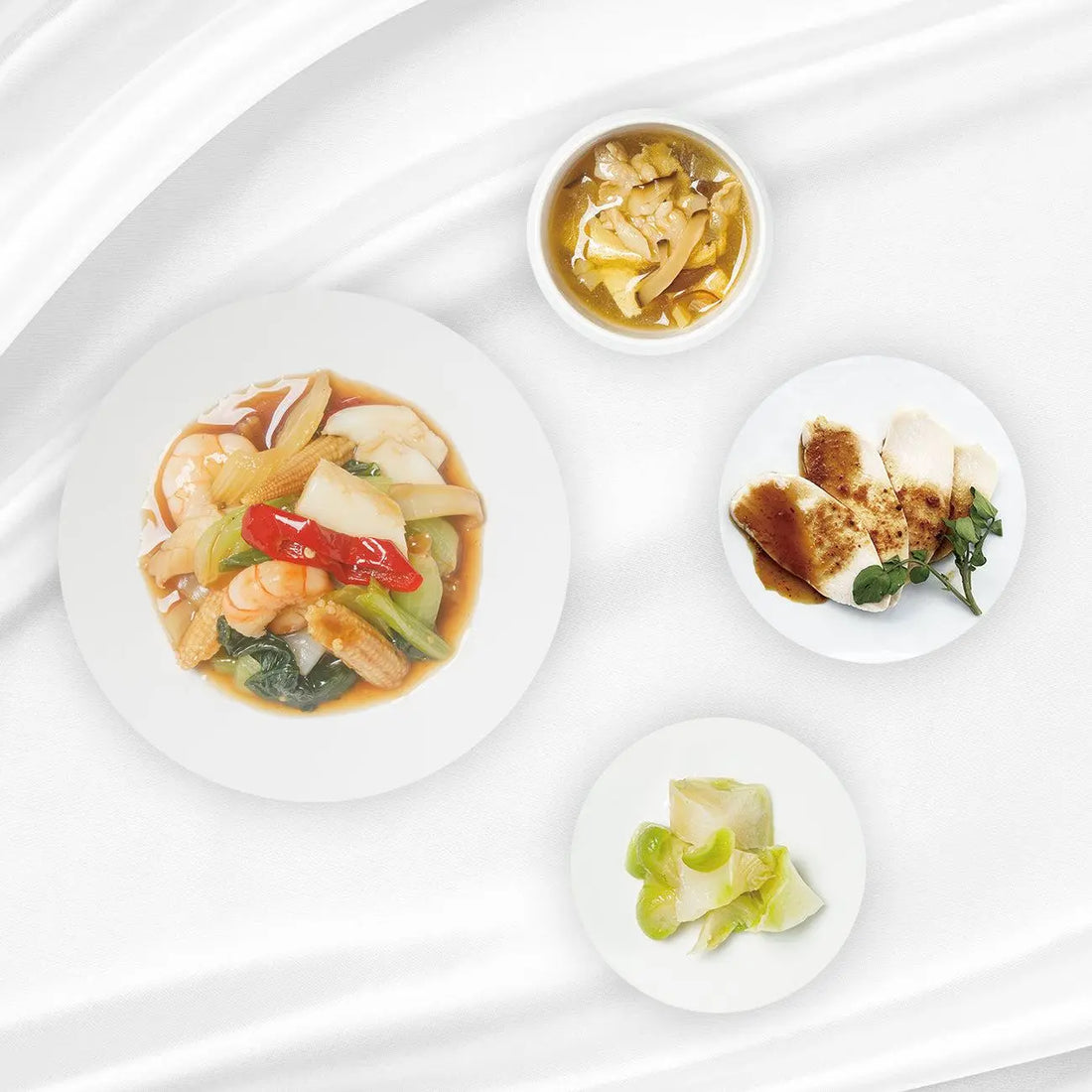 海老・いかのオイスターバジルソースと四川風ピリ辛鶏肉の中華定食